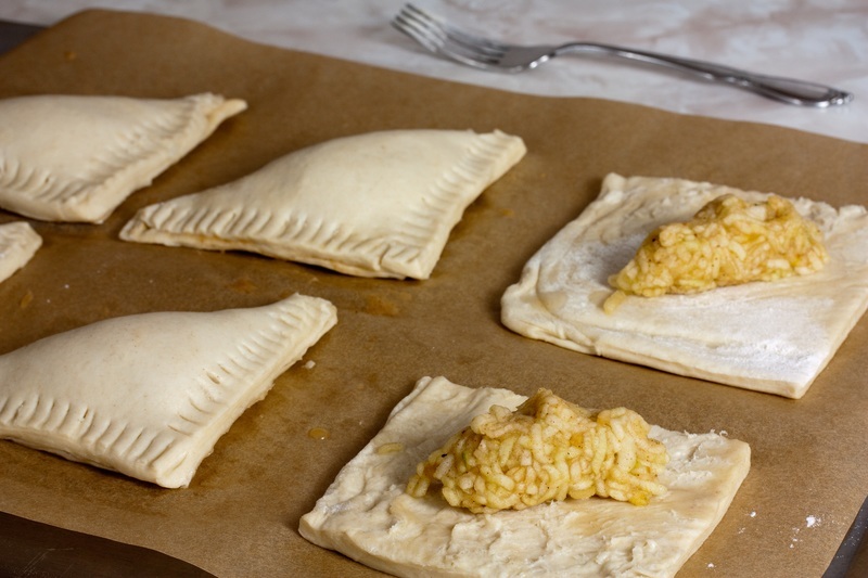 Fold the turnovers and crimp along the edges