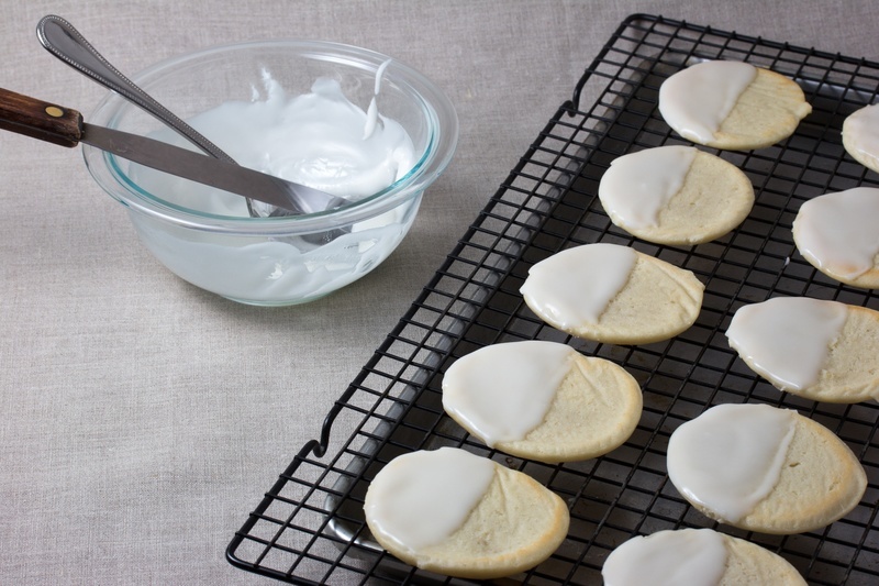 Vegan black and white cookies glazed with vanilla icing